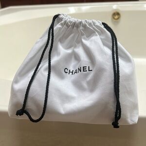 NWT Chanel drawstring white bag with black string